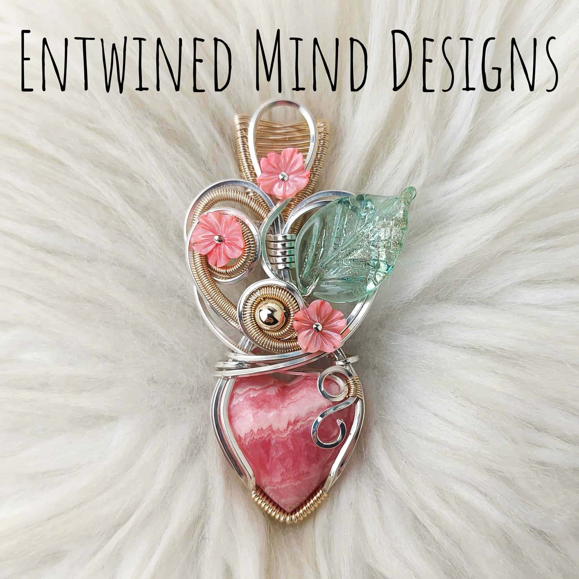 Artisan Cut Rhodochrosite And Sterling Silver Heart Pendant