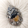 "Dragon Lair" Sterling Silver And Fossilized Palm Root Agate Statement Pendant