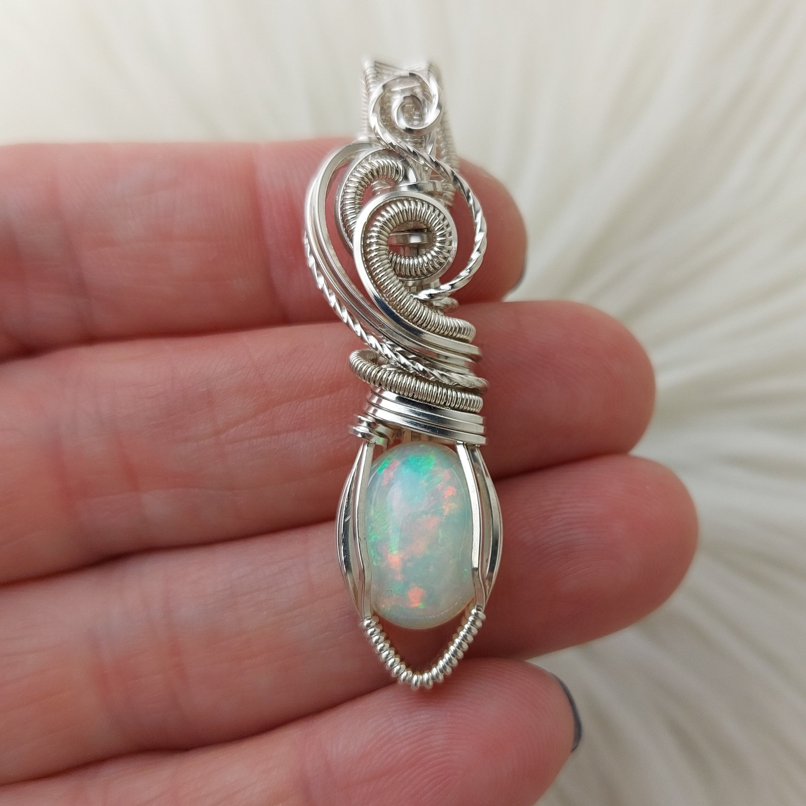 African Opal, good Moonstone and Onyx wire wrapped in Silver