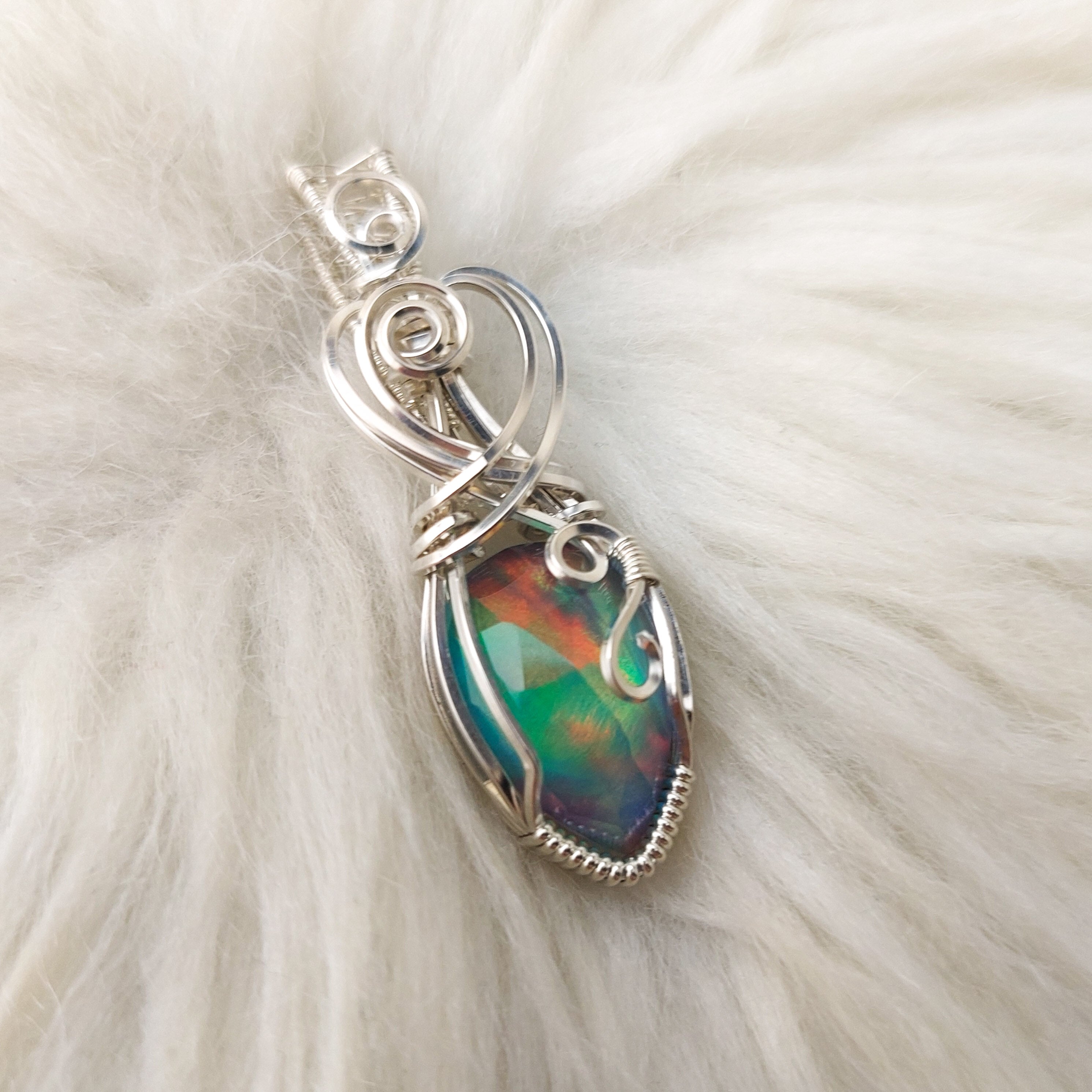 Aurora opal store Alien silver pendant