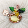 Glass Cats Eye Pumpkin Pendant In Copper