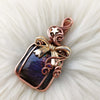 Purple Labradorite Present Pendant In Copper