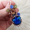 Spell Bottle Flower Pendant