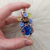 Spell Bottle Flower Pendant
