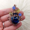Horse Shoe Blue Potion Bottle Pendant