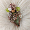 Doll With Green Potion Bottle Pendant