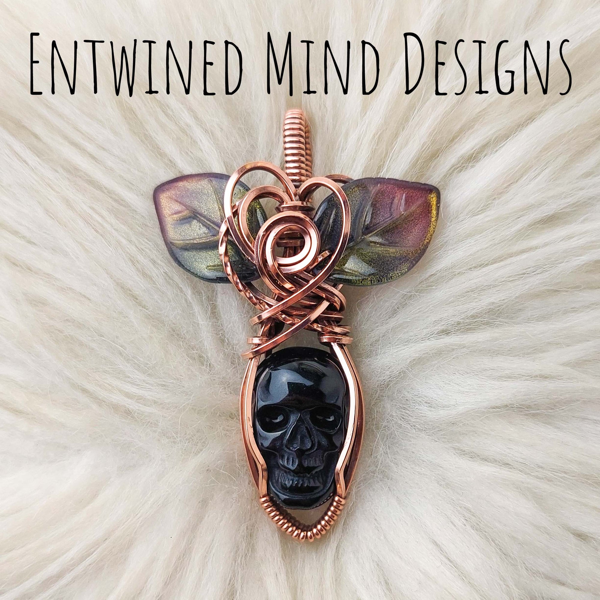 Obsidian Skull Pendant With Leaves
