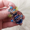 Blue Potion Bottle With Dragon Fly Pendant