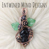 Obsidian Skull Pendant With Leaves And Flowers