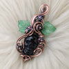 Obsidian Skull Pendant With Leaves And Flowers