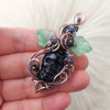 Obsidian Skull Pendant With Leaves And Flowers