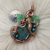 Mermaid And Glass Ammonite Pendant In Copper