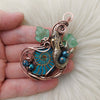 Mermaid And Glass Ammonite Pendant In Copper