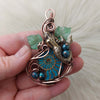 Mermaid And Glass Ammonite Pendant In Copper