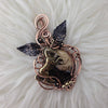 "Dark Horse" Fossil Palmroot Pendant In Copper