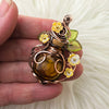 Amber Potion Bottle Pendant With Shell Flowers