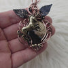 "Dark Horse" Fossil Palmroot Pendant In Copper