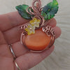 Glass Cats Eye Pumpkin Pendant In Copper